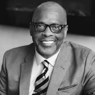 Black-and-white headshot of Larry Kemp